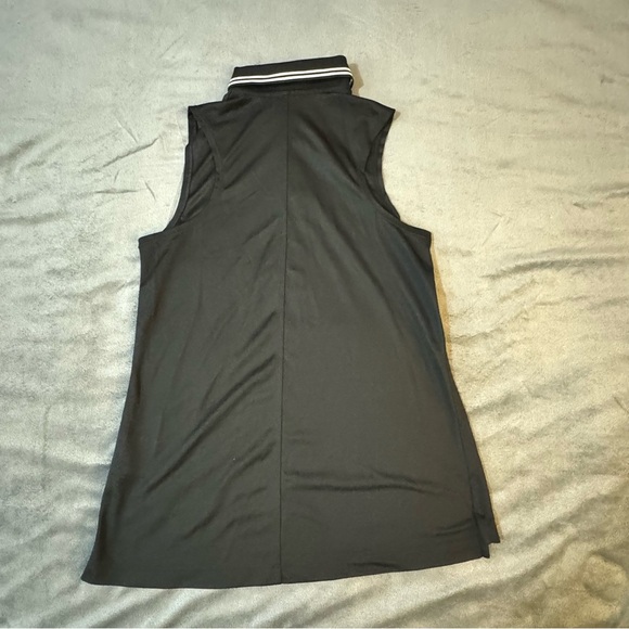 Nike Black Sleeveless Polo with White Trim

#1093 - Picture 7 of 7